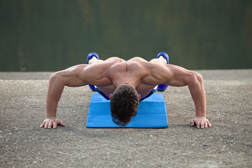 fitness man push up outside