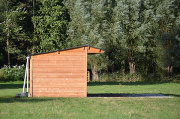 Newly built stable in a field