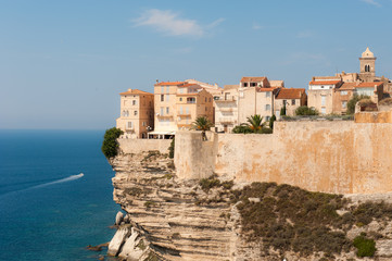 Fototapeta na wymiar Old town of Bonifacio is built high on a sea cliff. Corsica, France