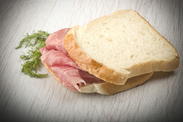 sandwich with Italian prosciutto crudo ,raw ham leg sliced