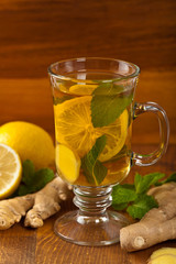 Ginger tea. Ginger, lemon, mint leaves. Selective focus.
