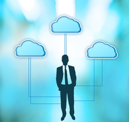 Businessman silhouette with clouds on bright background