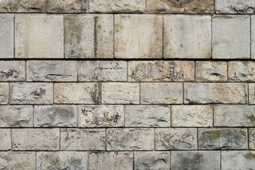 Old retaining wall made of granite stones