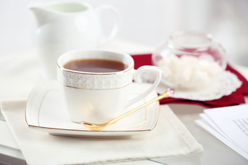 Cup of tea on table close up