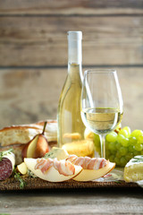 Still life with various types of Italian food and wine