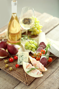 Still life with various types of Italian food and wine