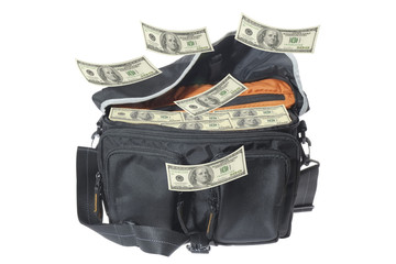 Hundred-dollar bills/Hundred-dollar bills falling to the bag.