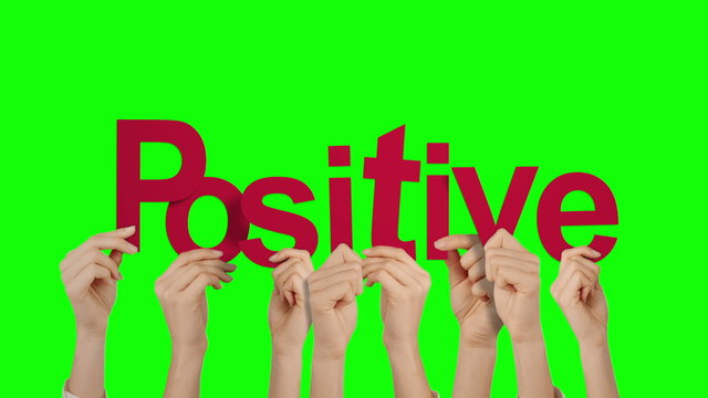 Hands holding up positive