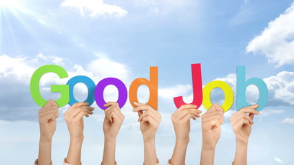 Hands holding up good job