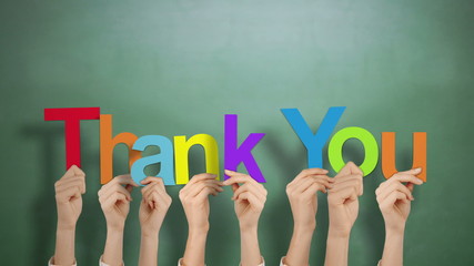 Hands holding up thank you