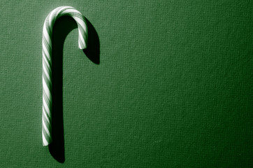 One green candy cane
