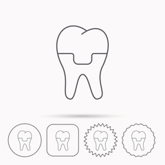 Dental crown icon. Tooth prosthesis sign.