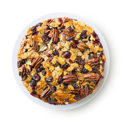 Pecan cake made with sliced almonds and dried cranberries isolated on white 