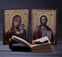 The Christian religion icon, prayer book, rosary