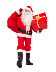 walking Santa Claus carries Christmas gifts isolated on white background