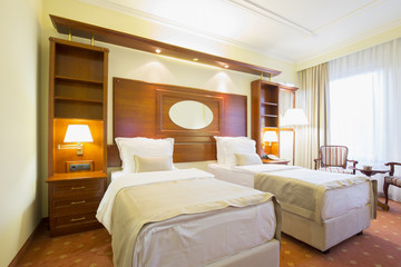 Elegant hotel twin bedroom