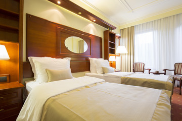 Elegant hotel twin bedroom