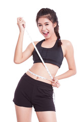 Fitness young woman taking measurements of her body. healthy concept