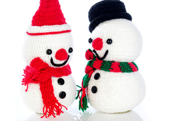 Two smiling snowman