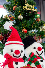 snow man with christmas decoration
