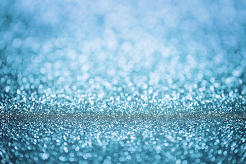 Christmas Background. Blue Holiday Glowing Glitter Bokeh Backgro