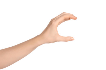 Beauty and Health theme: beautiful elegant female hand show gesture on an isolated white background in studio