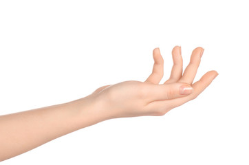 Beauty and Health theme: beautiful elegant female hand show gesture on an isolated white background in studio
