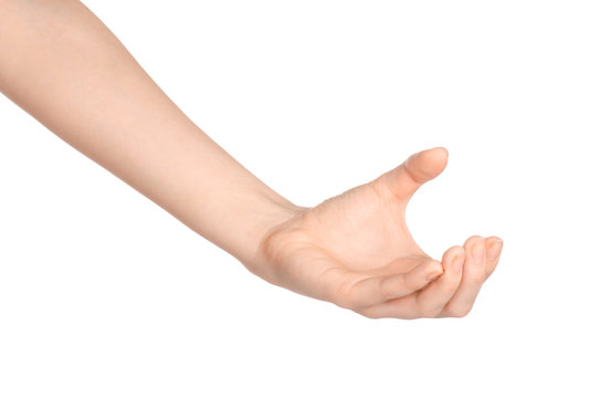 Beauty and Health theme: beautiful elegant female hand show gesture on an isolated white background in studio