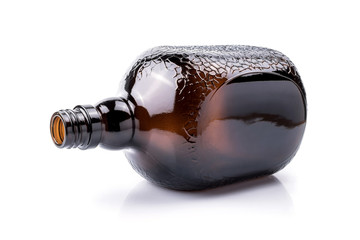 Brown transparent glass bottle.
