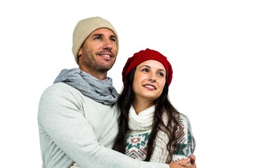 Smiling couple looking up