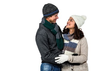 Winter couple enjoying hot drinks