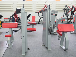 Fototapeta premium Interior of new modern gym with equipment