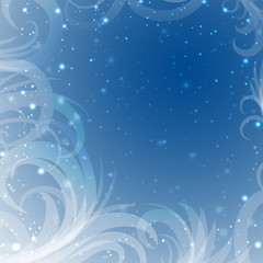 Fototapeta na wymiar snow tracery on a blue background with shine