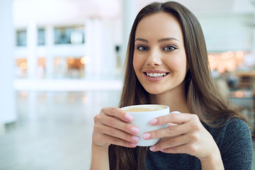 woman drinking coffee in the morning