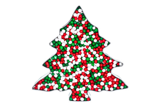 christmas tree cookie cutter with sugar sprinkles