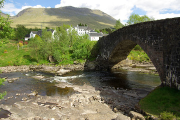 Fototapeta na wymiar GLEN ORCHY, SCOTLAND - June, 2013: Bridge of river Orchy