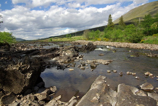 GLEN ORCHY, SCOTLAND - June, 2013: River Orchy in sunny summer d