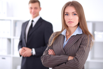 Face of beautiful business woman on the background of business people