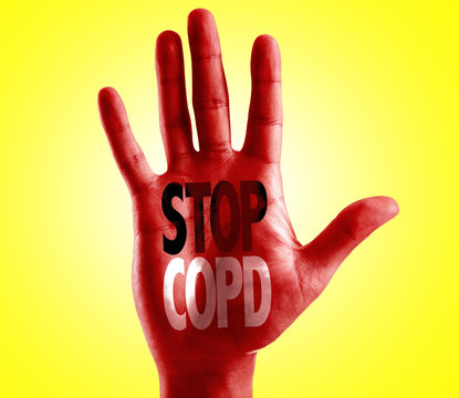 Stop COPD written on hand with yellow background