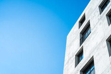 concrete facade of a building with windows