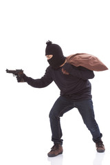 Bandit holding gun with bag on white background
