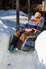 Close up of young pretty Norwegian woman enjoying some winter su