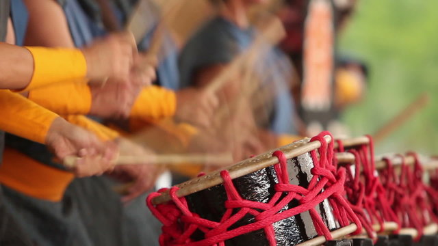 Detail clip of taiko drums being played.