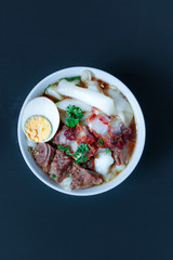 Crunchy Pork Soup, Top view on black background