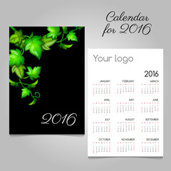 Black calendar 2016 with green leaves decoration
