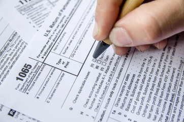 Person completing 1065 tax form