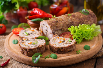 Minced meat loaf roll with mushrooms and carrots