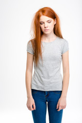 Obraz premium Portrait of sad exhausted young girl with long tousled hair