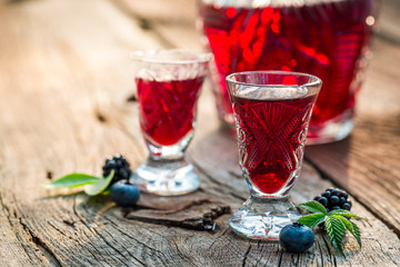 Fresh liqueur with berry fruits and alcohol