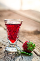Homemade liqueur with strawberries and alcohol